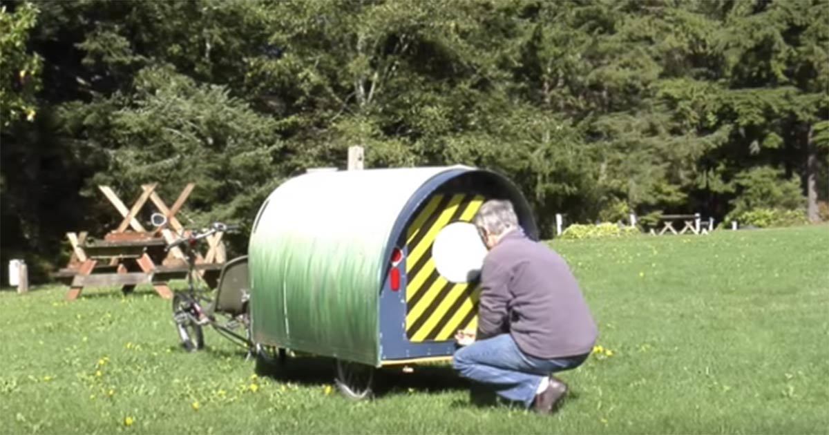 He lives in a camper he pulls around with his bike - and it's amazing ...