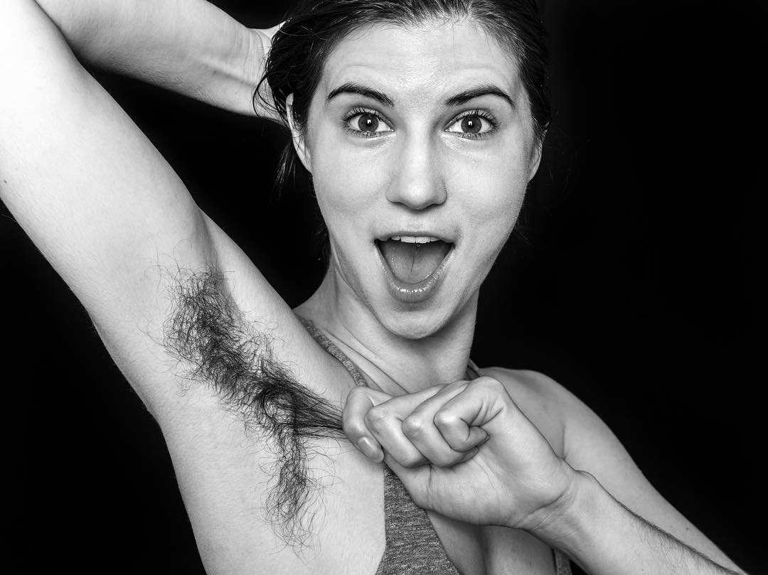 Photographer snaps photos of women with armpit hair and people are torn.