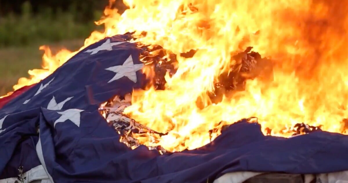 Veterans gather in Kentucky field to watch 25,000 American flags burn