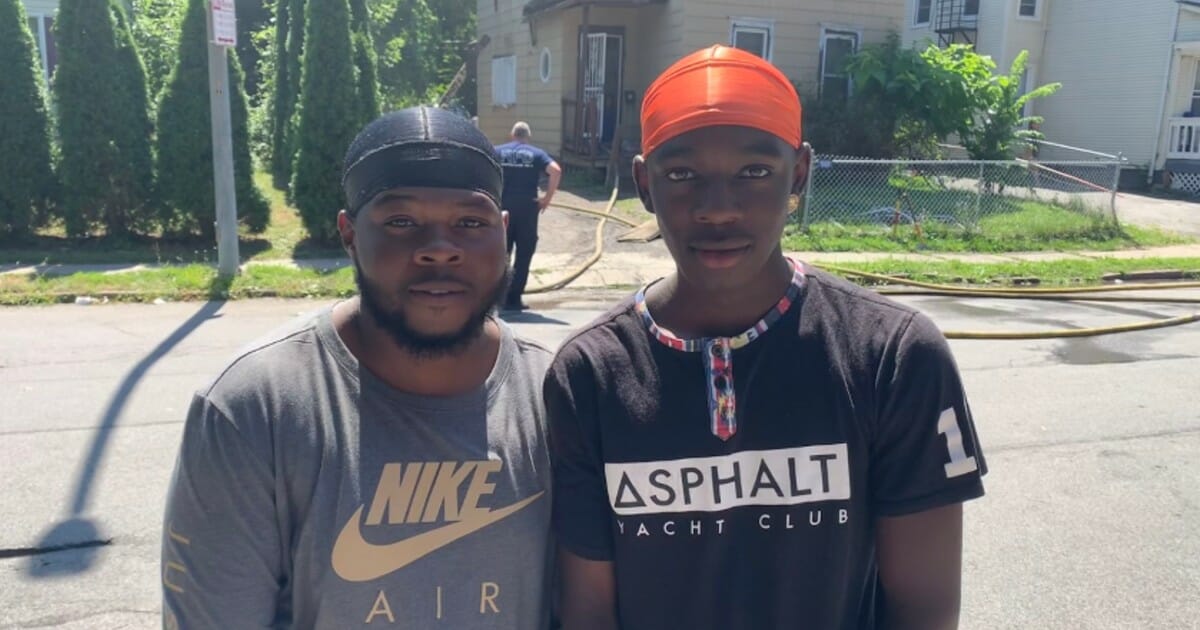 Young men rush into burning home and save family of five