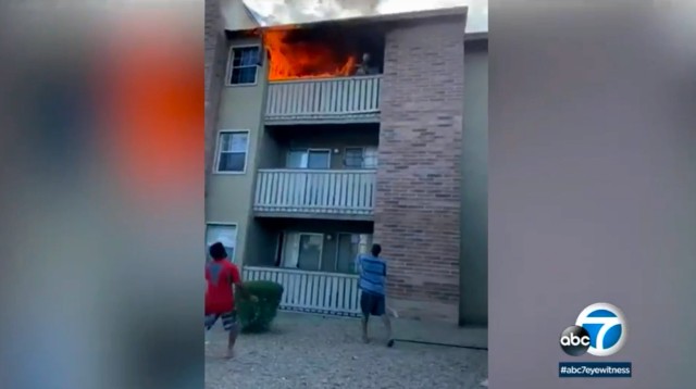 Mother throws toddler out of burning third-floor apartment ...