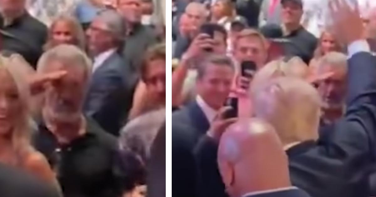 Mel Gibson is seen on camera saluting former President Donald Trump